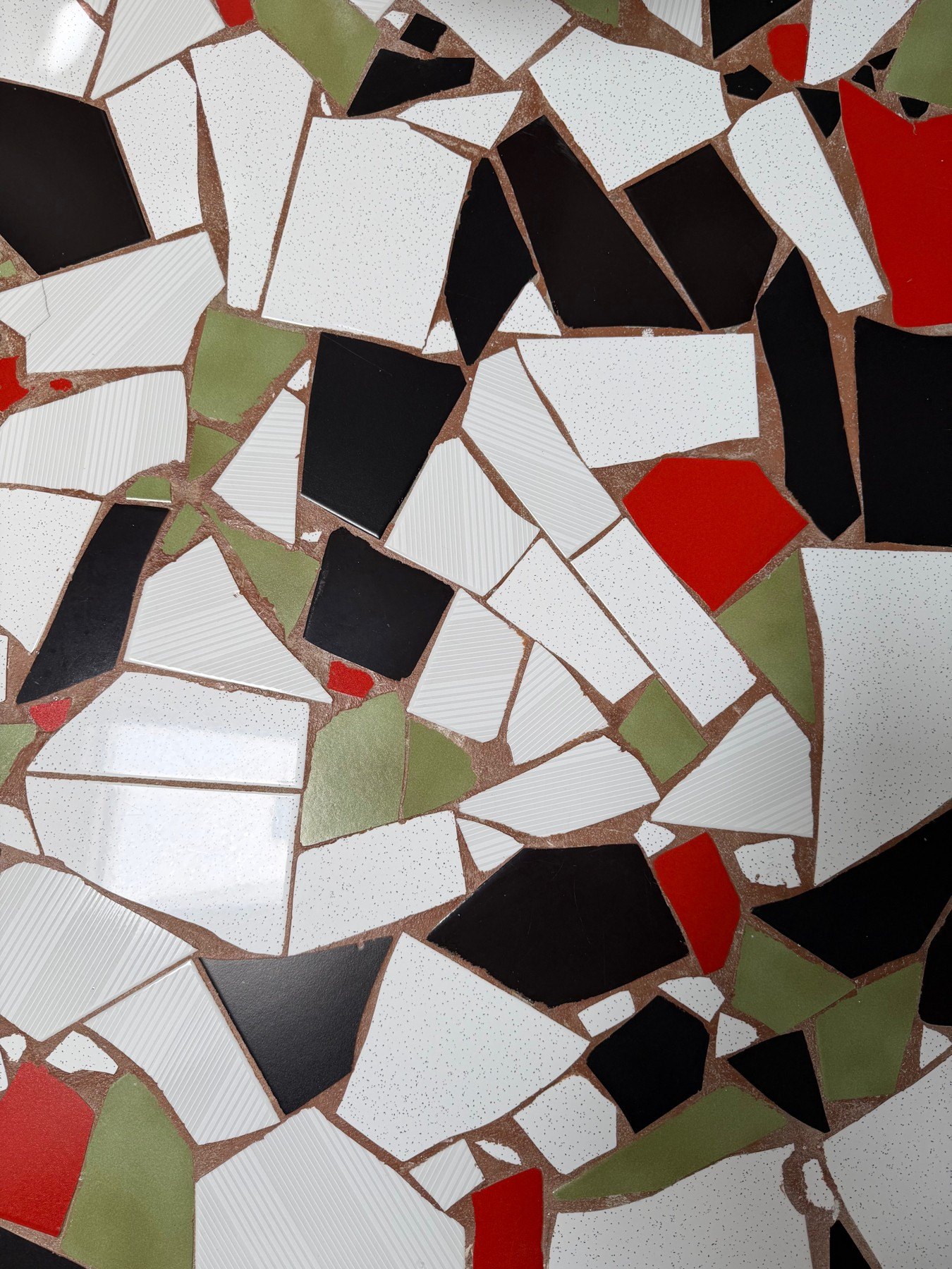 The mosaic floor in the bathroom